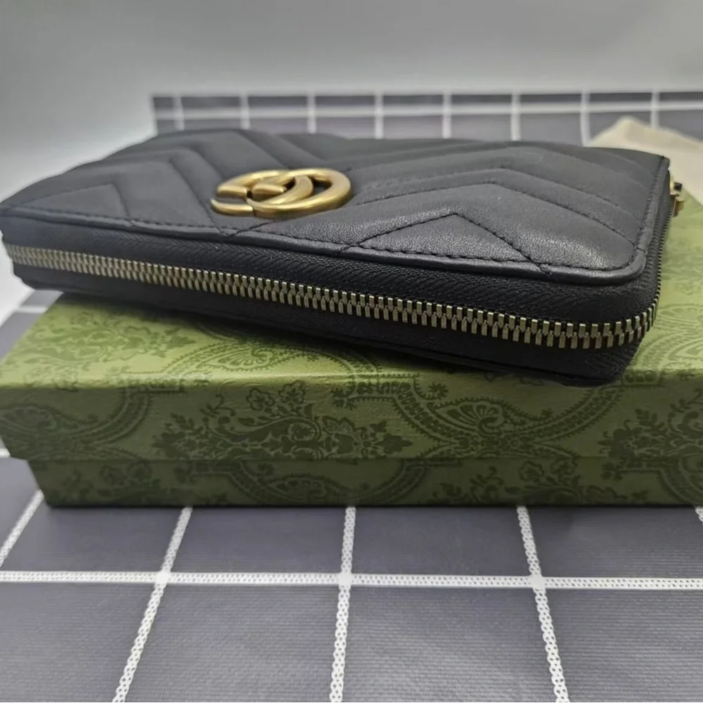 Gucci Black Wallet with Gold Logo